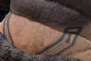 Tattoo on Thor's neck