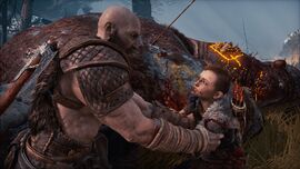 Kratos y Atreus tras matar a Daudi Kaupmadr