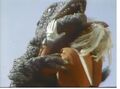 A closeup of Godman and Gorosaurus fighting