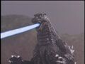 Godzilla fires it's ray at King Ghidorah