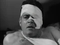 Godzilla-King-of-the-Monsters-Raymond-Burr-wounded.png (359 KB) Martin in hospital