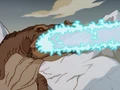 Komodithrax fires her blue atomic breath.