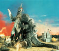 Godzilla and Gigan fight.