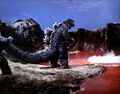 Son Of Godzilla - Godzilla Stands In Front Of A Red Lake