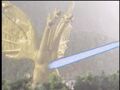 King Ghidorah withstands Godzilla's ray