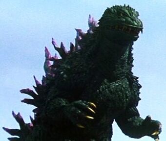 godzilla toy with blue fire