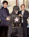 Kitamura with the FinalGoji suit and Shogo Tomiyama