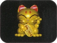 Golden Fortune Doll render from the Mystical Ninja Starring Goemon instruction booklet.