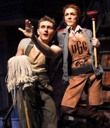 Penny Pennywise and Bobby Strong in Urinetown.