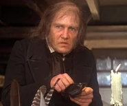 Ebenezer Scrooge in Scrooge.