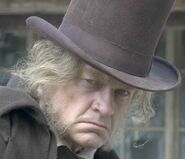 Ebenezer Scrooge in A Christmas Carol.