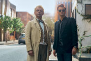 Aziraphale and Crowley standing
