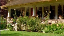 The covered front porch of the Duncan's house.