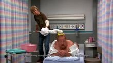PJ gives a man a sponge bath.
