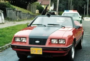 A production still of the car chase.