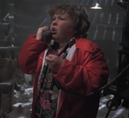 Chunk, on the phone with the Sheriff.