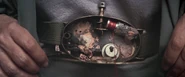 The inner mechanisms on his belt.