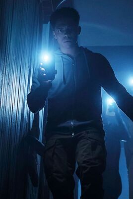 Isaiah going into the Biddle basement