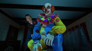Murder the Clown is on the dining table and slappy is at the back of him