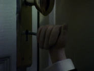 Slappy locks the bathroom door with Harrison inside.