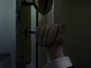 Slappy locks the bathroom door with Harrison inside.