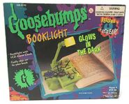 Spiderweb Glow-in-the-Dark Booklight in box