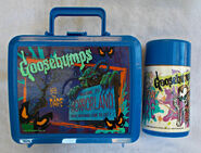 One Day at HorrorLand lunch box and Curly cup.