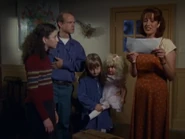 Jillian Zinnman with her family and a mystery package.