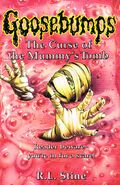 A mummy seen drowning in goop on the UK cover of The Curse of the Mummy's Tomb.