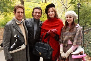 With partner, step-daughter and former friend.