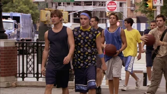 Nate and Chuck playing basketball with their friends