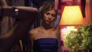 Jenny trying on the dress gifted to her from Blair