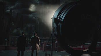 Bruce Wayne and Jim Gordon at the searchlight