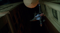 Lt. Bill Cranston flying into the air to his death after being attatched to the air-balloon by the Balloonman