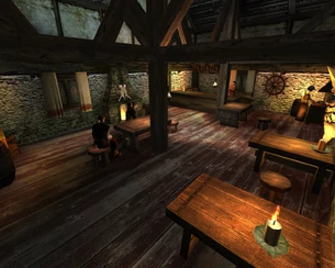 Wnętrze gospody nocą