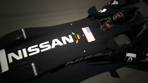 The 2012 DeltaWing as it appears in the Start Your Engines trailer. Note the use of DeltaWing-branded driver suit and helmet, instead of Nissan branded ones.