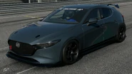Andrew Brooks' MAZDA3 X in the Japanese 4WD Challenge 600 event in later versions of the game. Note of the generic Gran Turismo Windshield Banner.