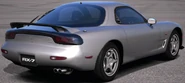 The Mazda RX-7 Type R (FD, J) '93 as seen from the rear. The "RX-7" logo is now silver as opposed to red.