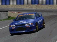 A Nissan SKYLINE GT-R NISMO (R32) '90 with racing modifications applied in the original Gran Turismo. Like any other variant of the Nissan Skyline GT-R (R32) available in the game, it has a livery based on the Calsonic-sponsored Team Impul cars entered in the JTCC. This racing modification is available in two color schemes: Red and Blue.