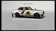 A Mitsubishi Lancer 1600 GSR Rally Car '74 being awarded to the player's birthday linked in their PSN account in Gran Turismo 6.