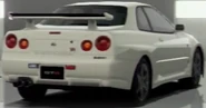 The Nissan SKYLINE GT-R M • spec (R34) '01 as seen from behind. Notice the "M-spec" logo below the right taillights.
