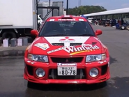Kazunori Yamauchi's personal Lancer Evolution V with replica 1998 Rally Australia decals.