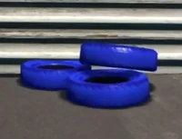 A stack of blue tires in the secret area of Mount Panorama, the key to winning this trophy.