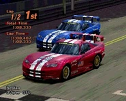 A Dodge Viper GTS '99 with racing modifications applied, shown in both color schemes, Red and Blue. While the Red color scheme (front) bears a strong resemblance to the Viper GTS-R used by Team Oreca in the 2000 American Le Mans Series season, the Blue color scheme (back) appears to resemble the #64, driven by Jari Nurminen, Hans Hugenholtz, and Chris Gleason during the 1997 24 Hours of Le Mans.
