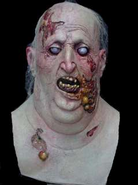 The Fatman Zombie mask. Slendrina's Mother's face and Spider Mom's face is based on this.