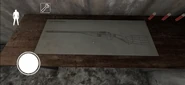 A picture of the Shotgun blueprints on the table in the Garage. (V1.8)
