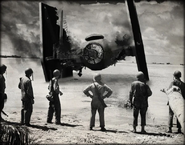 Allied soldiers standing before a crashed TIE Fighter