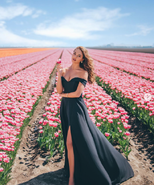 Leysa in a field of flowers