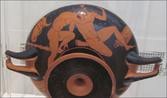 Red-Figure Kylix circa 500 BCE. Depicting Herakles fighting the Libyan Giant, Antaios.