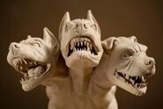 Up-close shot of a statue of Cerberus